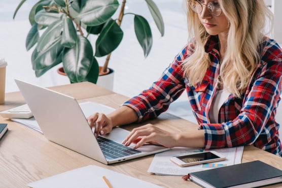 depositphotos_223451090-stock-photo-focused-businesswoman-using-laptop-workplace