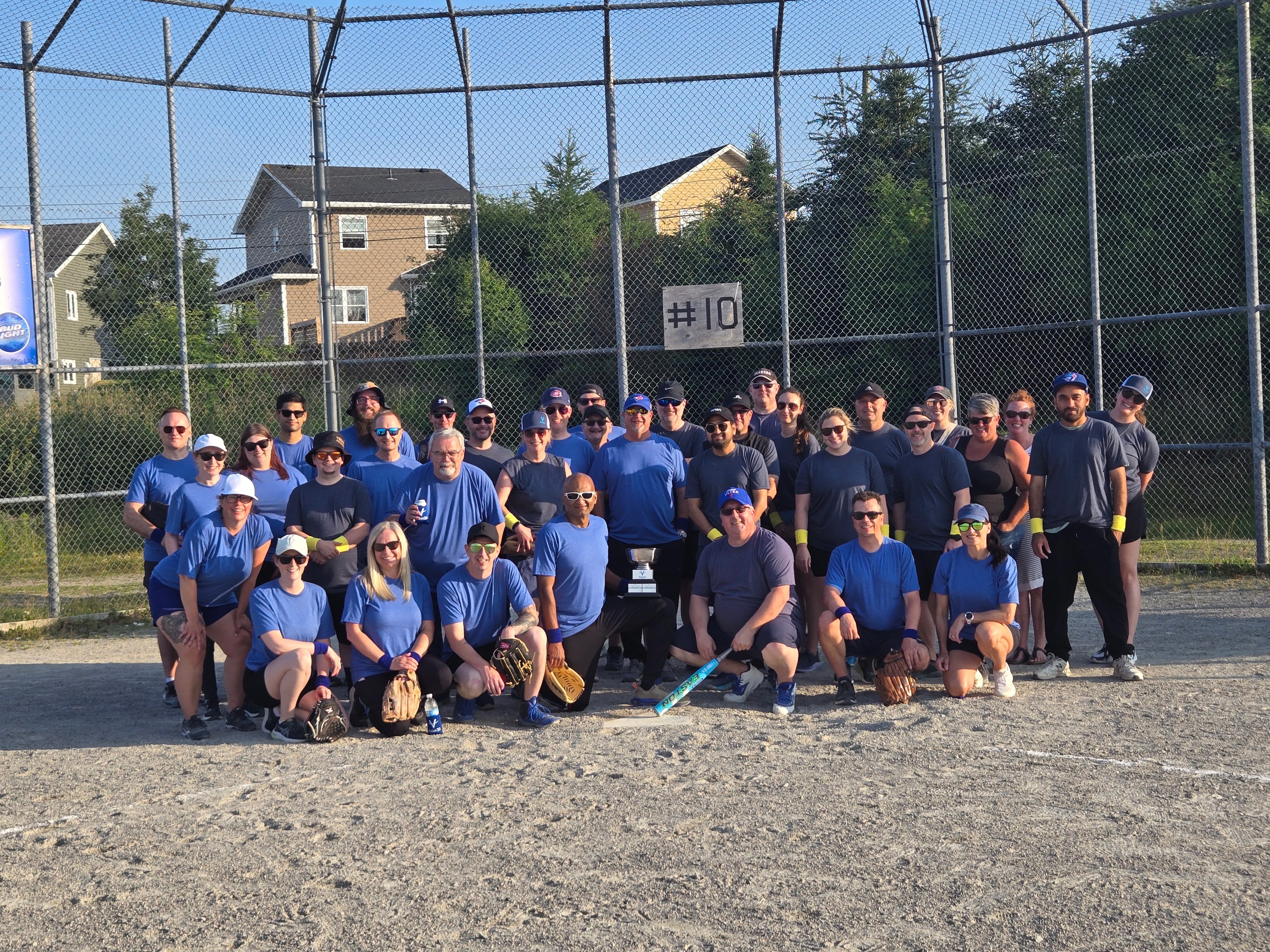 About Us - Softball Game 2025