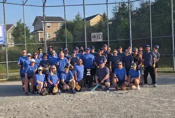 About Us - Softball Game 2025