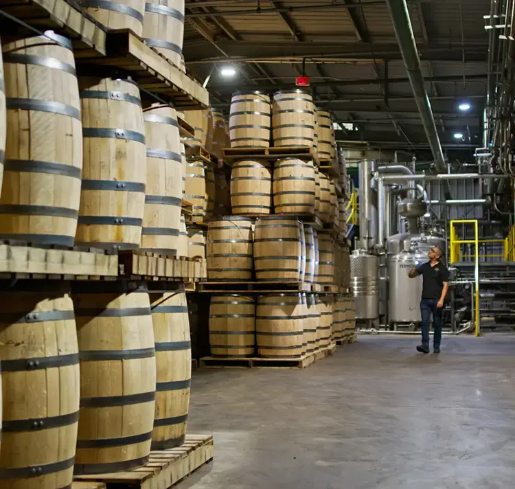 Wine Barrels in a warehouse organized by Brutos Distillery Management Software